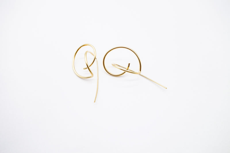 Intricate gold earrings arion