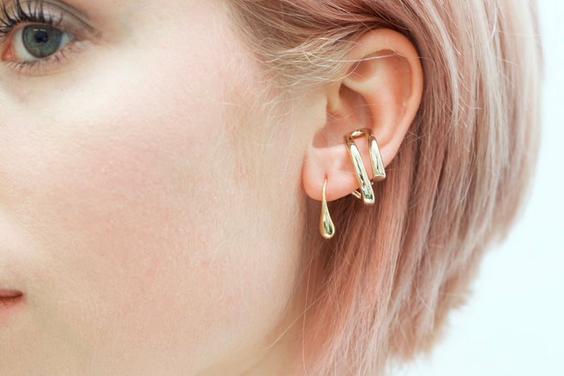 arion gold earrings
