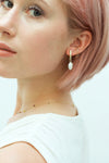 arion ear cuff pearl earrings rainbow necklace